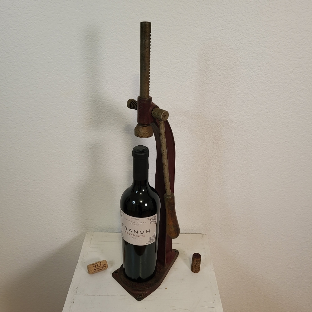 "Wesglasco" antique cast iron bottle capper in red